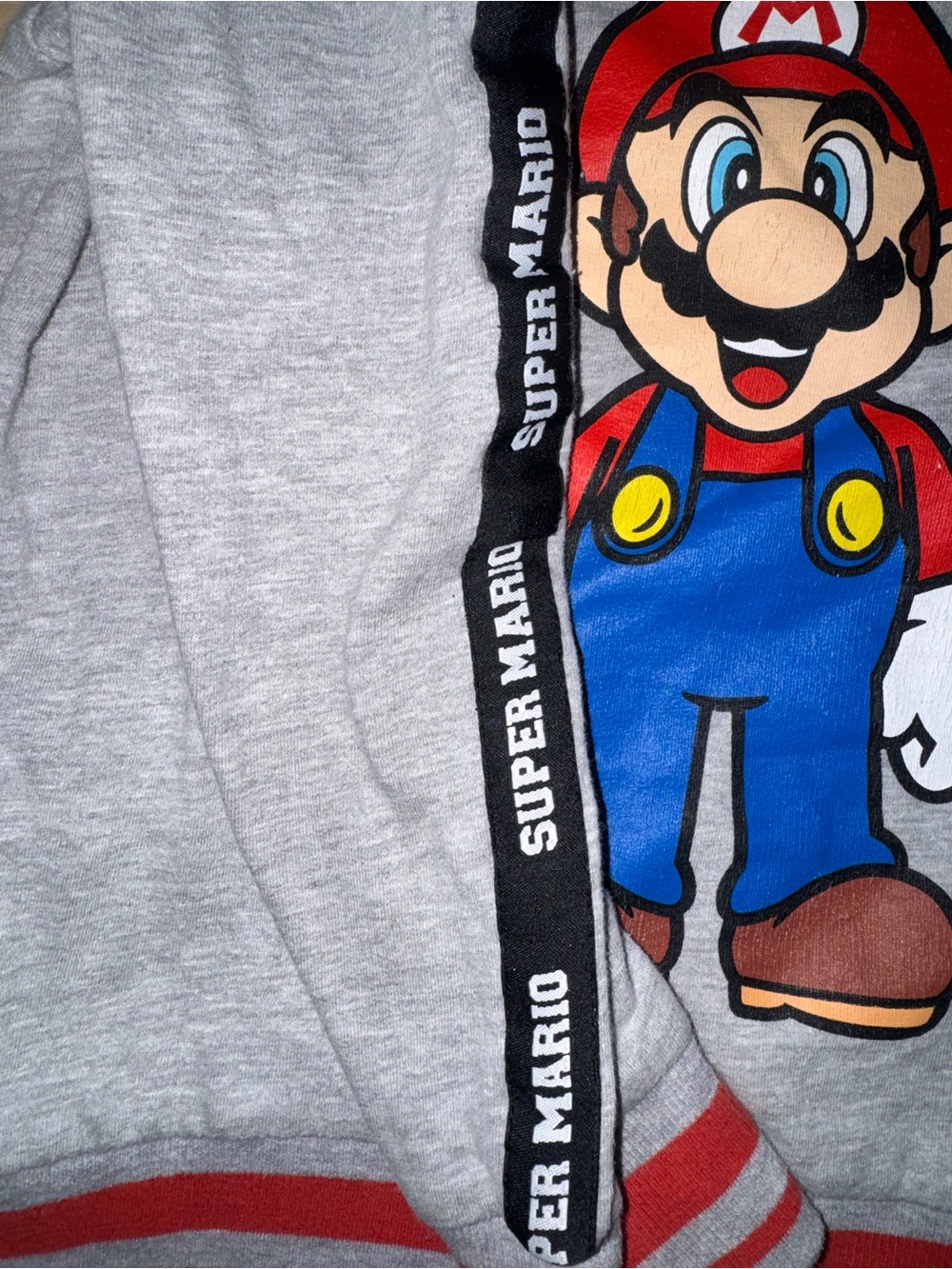 Nintendo Kids Gray Hooded Jacket with Super Mario Graphic and Red Trim